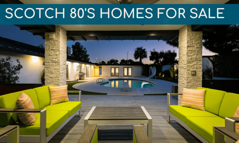 backyard patio furniture green with pool in background