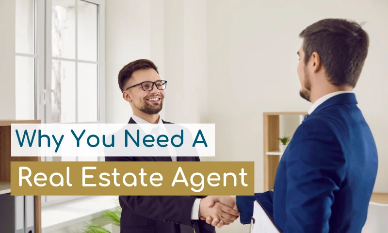photo of a real estate agent and a home buyer shaking hands